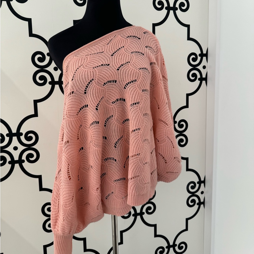Peach drop shoulder knit sweater.